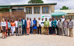 Large group of people standing outside office
