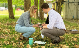 Workshop participants trying soil infiltration measurement