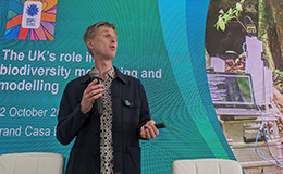 Nick Isaac speaking at a COP16 event